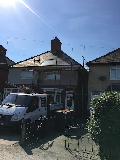 Roofing work on a residential pitched roof with scaffolding by A.H.Roofing in Mansfield